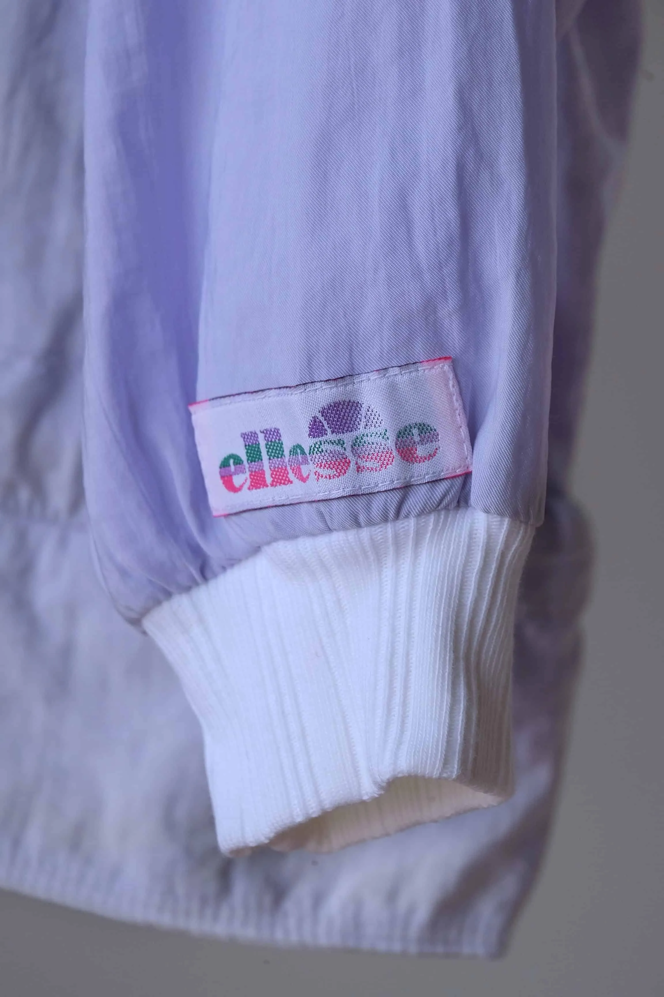 ELLESSE Vintage Women's Lilac Windbreaker & White Leggings Set